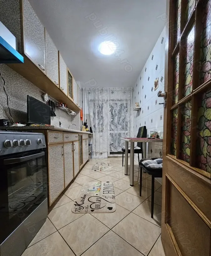 Unirii apartament 3 camere an 2000 etaj 1 7