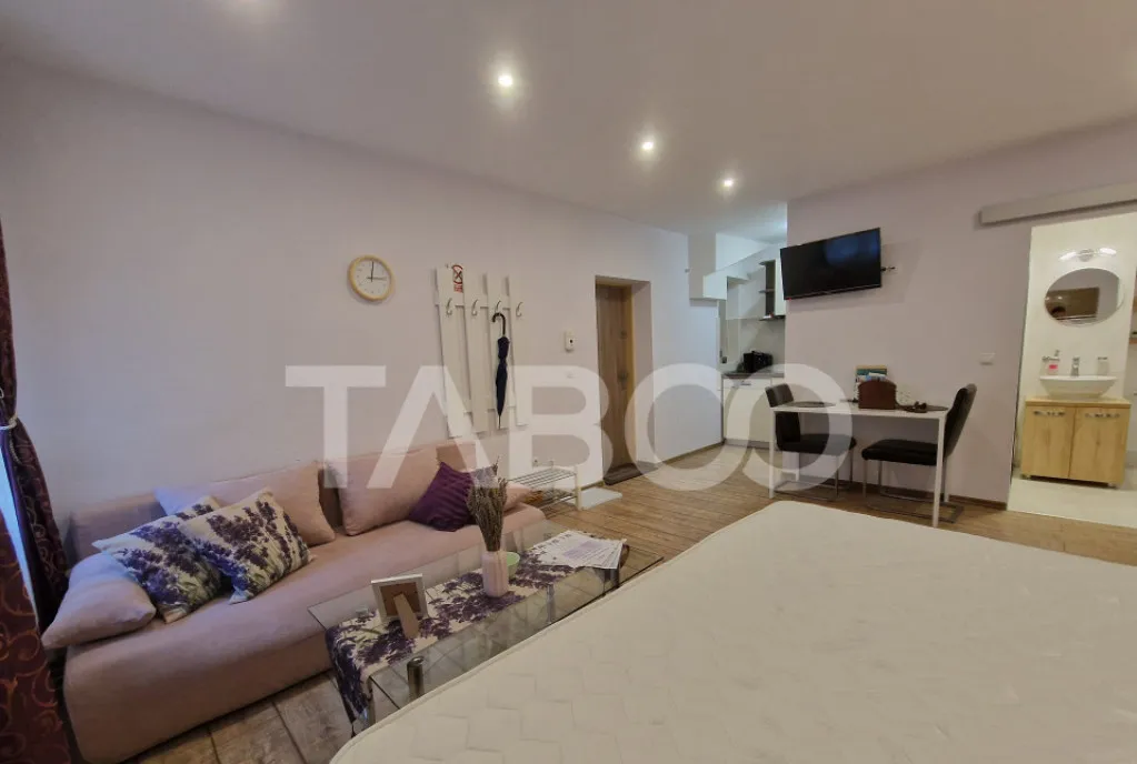 Garsoniera 32mpu de vanzare in centrul istoric al Si