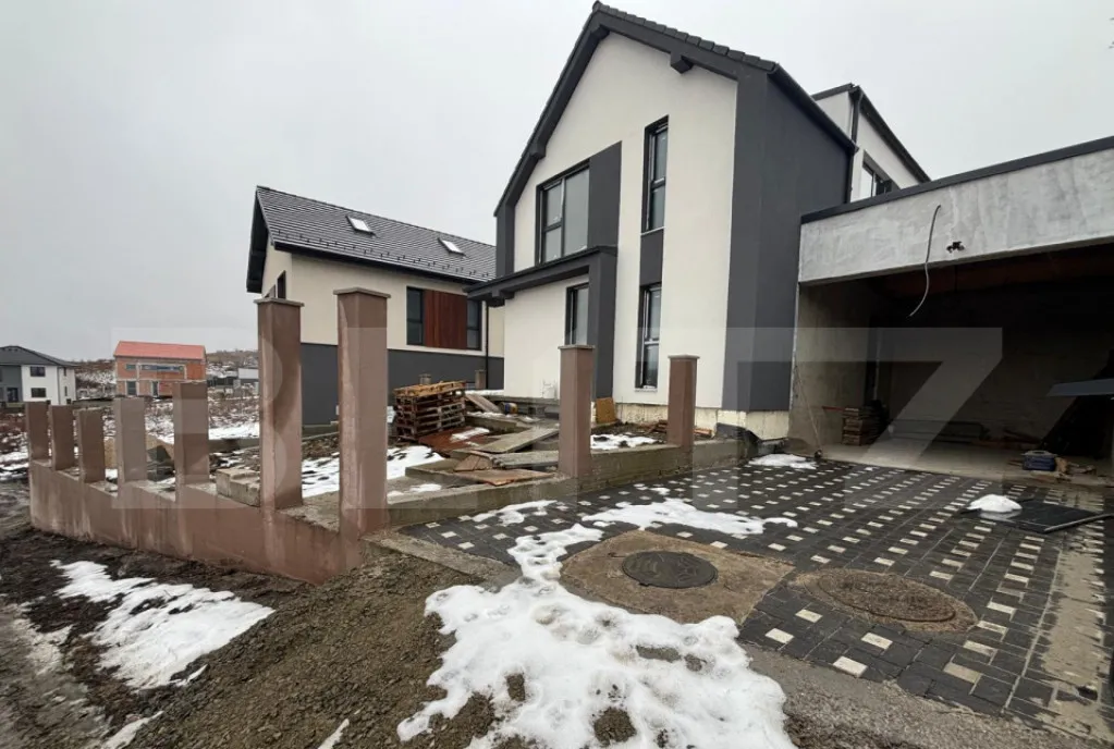 Casa cf 4 camere 136mp teren 700mp garaj 21mp