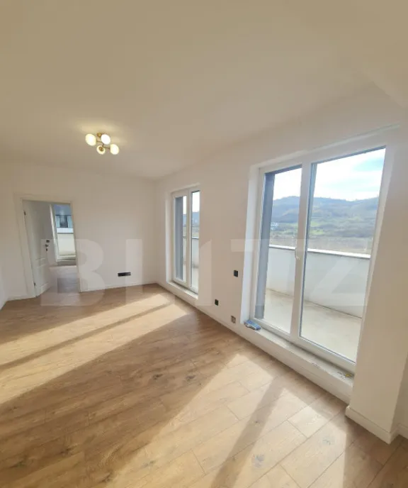 Apartament finisat 52 mp utili terasa 34 mp zona Terra