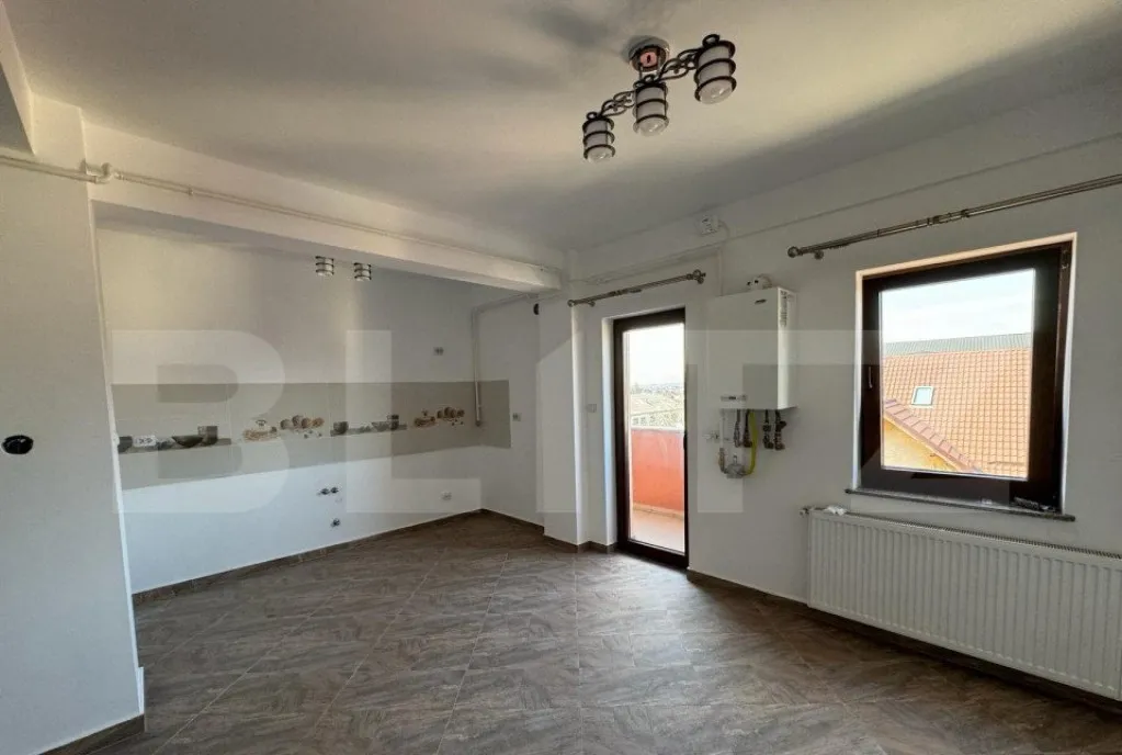 Apartament 3 camere 100mp situat pe 2 niveluri zona Radau