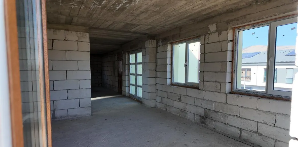Chinteni strada Iris casa pe 1 000 mp teren la pret de duplex