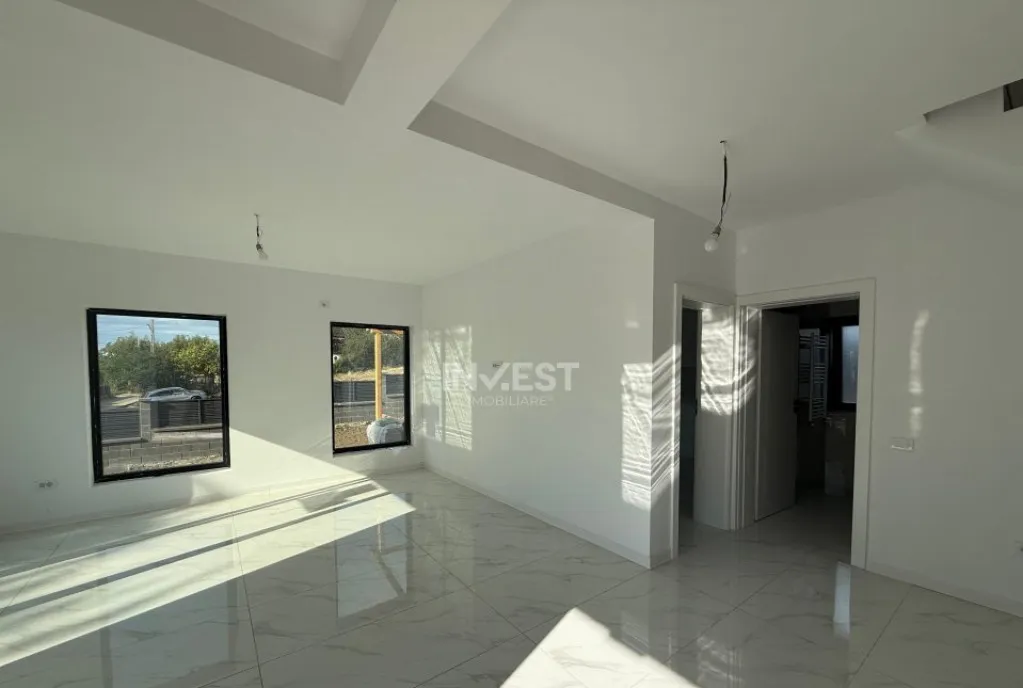 Casa de vanzare 4 camere 116mpu 290mp teren Bucium Visan