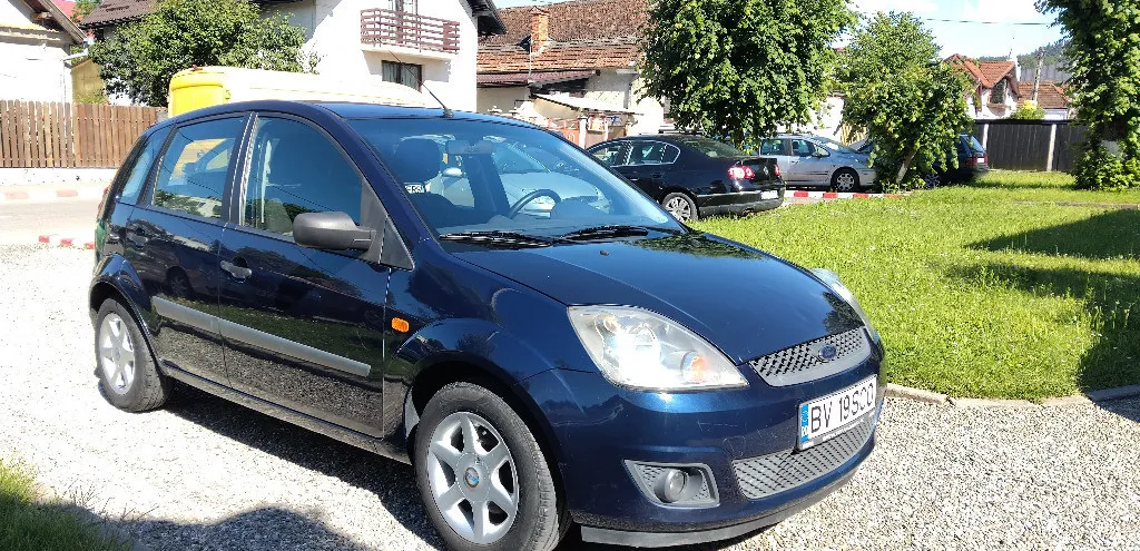 FORD FIESTA 2006 1 25 5 USI clima computer de bord roti iarna si vara 1 350 eur