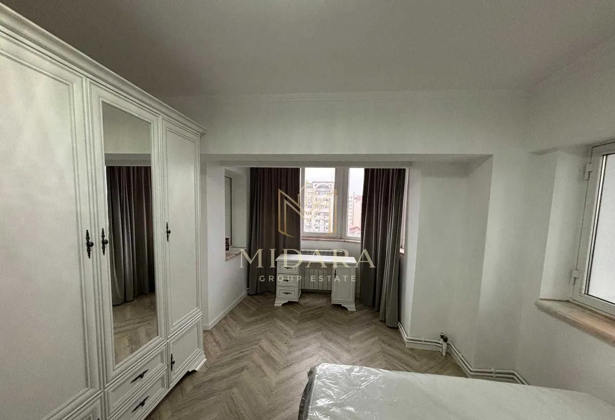 Unirii 3 camere 92 mp vedere bulevard 1100 eur/luna