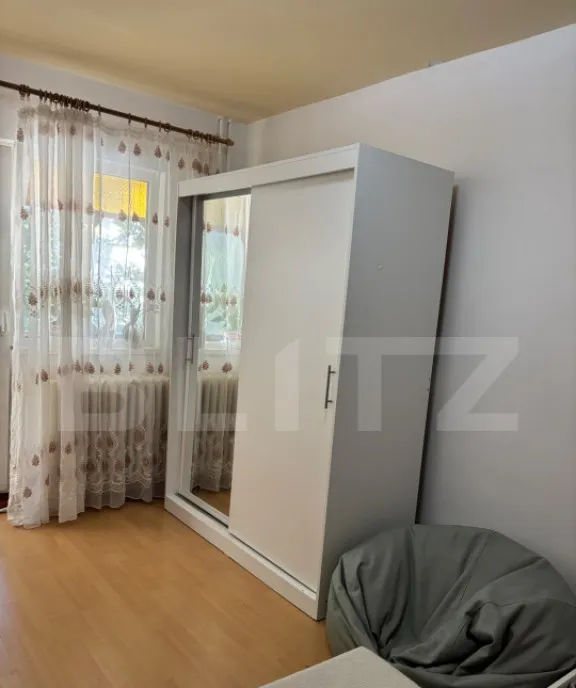 Garsoniera cu balcon etaj intermediar centrala proprie