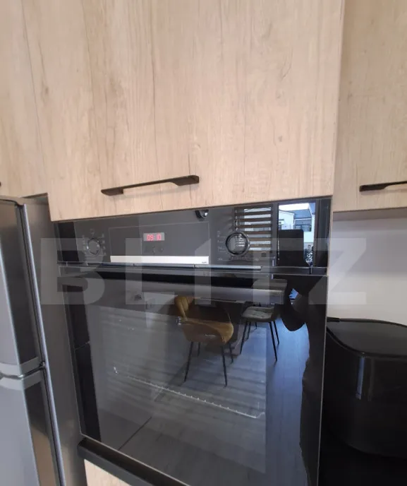 Garsoniera de vanzare 38 50 mp parcare subterana zona Tra