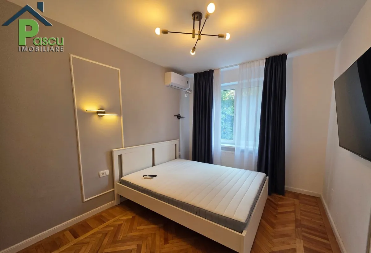 Piata Romana 3 camere 70 mp 2 bai mobilat modern langa metrou