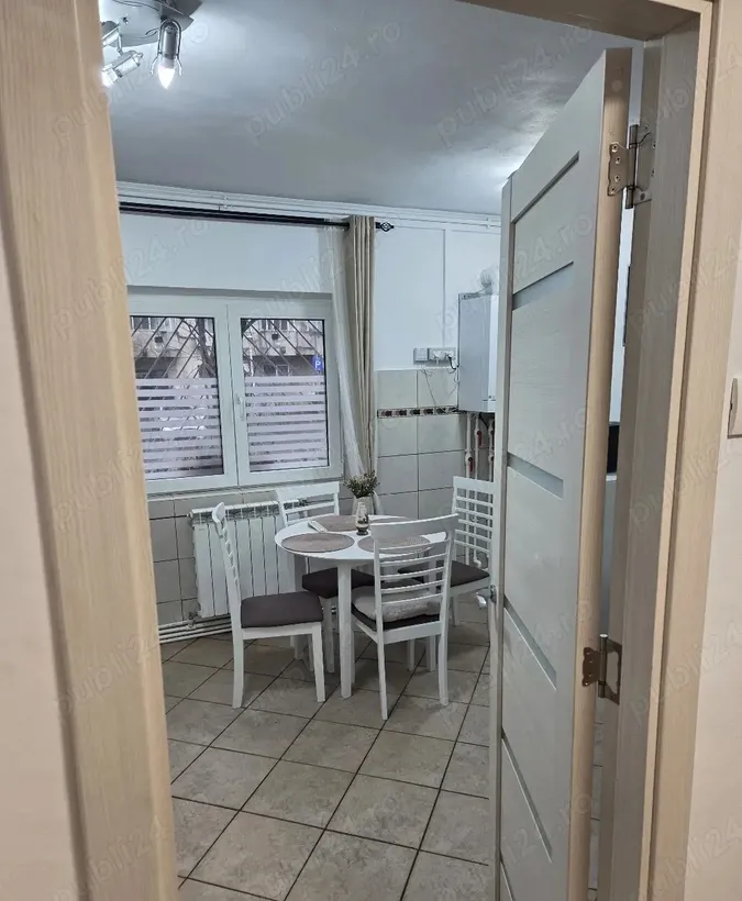 Unirii ap 2 camere 60 mp utili Aleea Botorani centrala mobilat si utilat