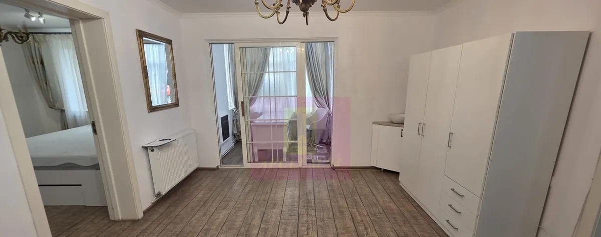 Apartament cu 2 camere spatiu comercial - Campina central