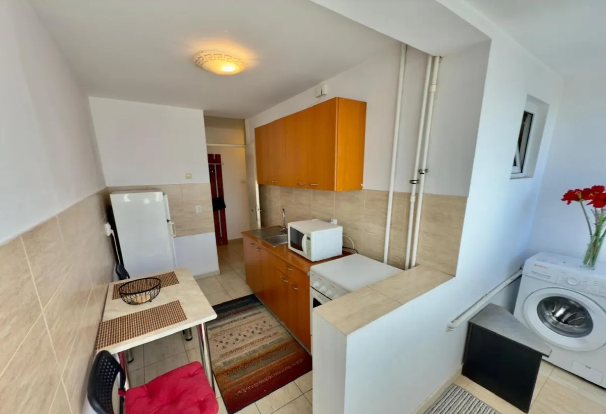 Universitate 2 camere mobilat/ utilat Bd Balcescu/ negociabil