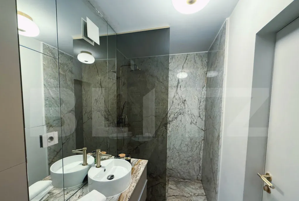 Apartament cu 2 camere lux parcare subterana zona centra