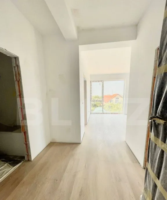 Apartament nou de 2 camere 54 mp gradina si parcare zona