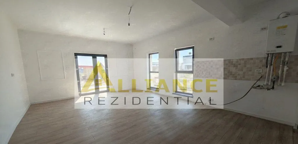 Casa pe parter cu 3 camere 2 bai si teren de 375 mp