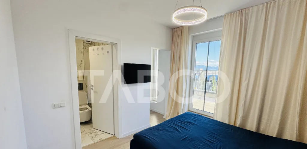 Penthouse cu terasa de 51mp de vanzare 3 camere 2 bai 1 par