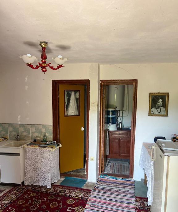 Casuta de la tara teren 5960 mp comuna uda jud arges