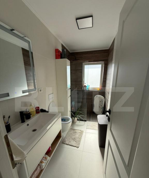 Apartament cu 3 camere 65 mp si un foisor cu gradina de 19