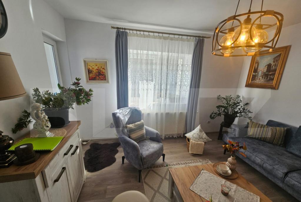 Casa 110 mp utili 328 mp teren finisata Chin