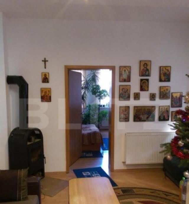 Casa cu 4 camere 119 mp utili 660 mp teren zona Dambul