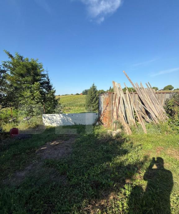 Casa la rosu 64 mp teren de 2600 mp zona Frumoasa