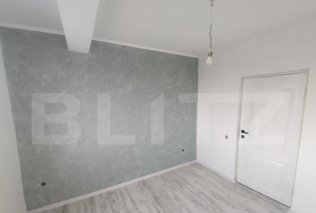 Casa tip triplex 77 mp 220 mp teren curte separata Horpa