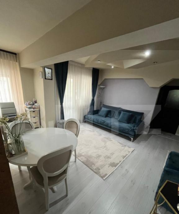 Apartament cu 4 camere finisat mobilat etaj intermediar