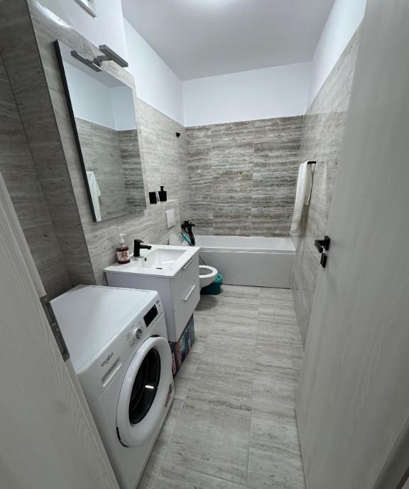 Garsoniera moderna mobilata si utilata complet titan