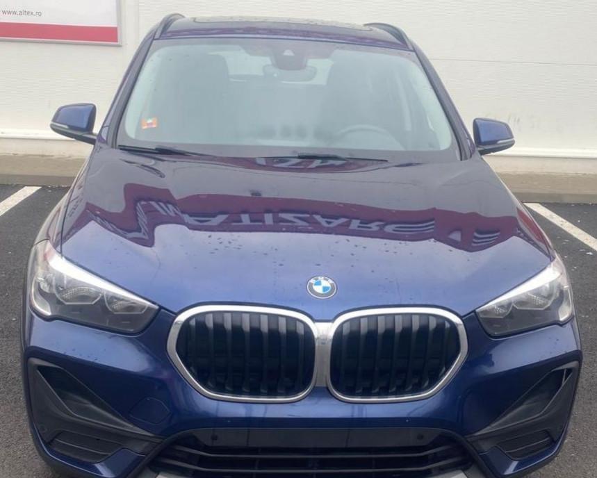 BMWx1 masina aproape noua 16 000 eur