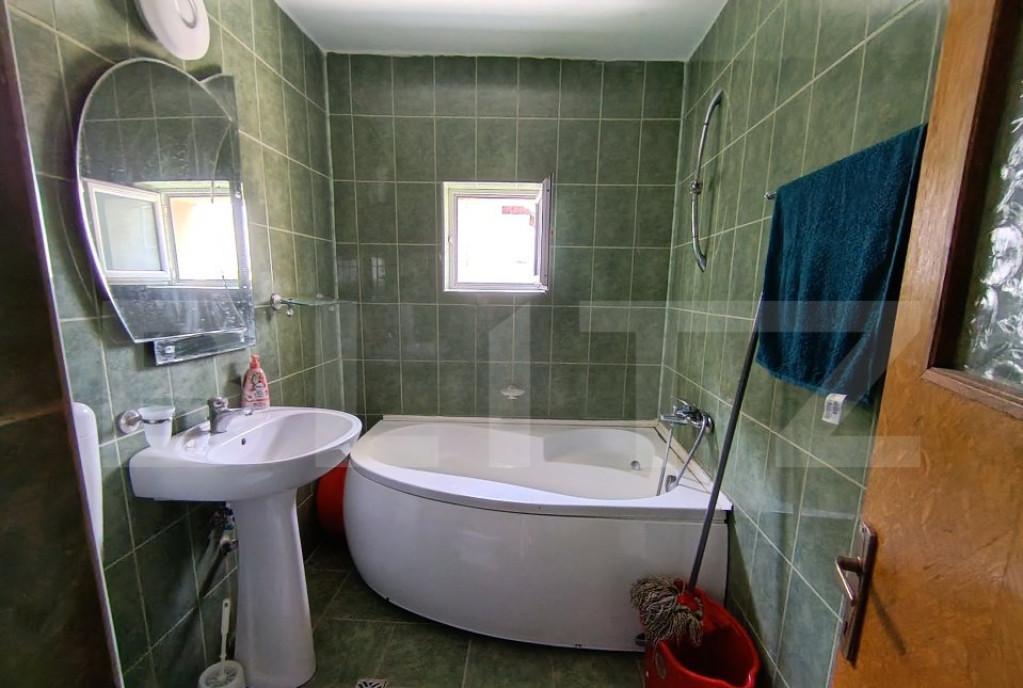 Apartament 3 camere in suprafata de mp67 si garaj sub bl