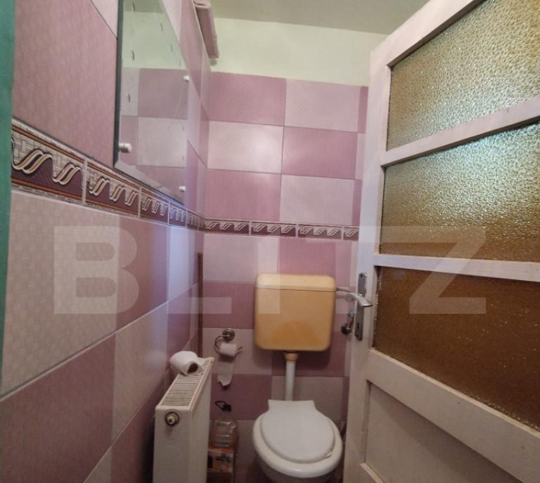 Casa de vanzare 83 70 mp teren 413 mp zona Modern