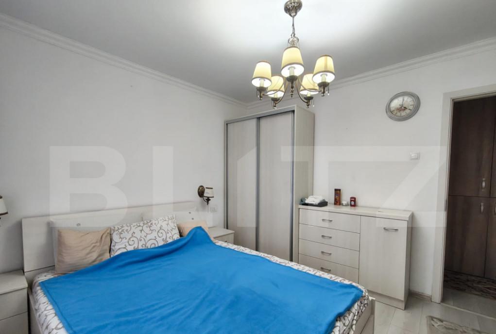 Apartament cu 3 camere cu bucatarie extinsa si 2 bai in Ro