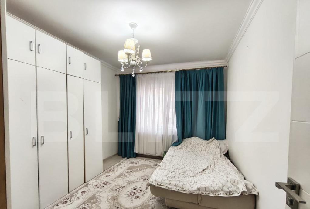 Apartament cu 3 camere cu bucatarie extinsa si 2 bai in Ro