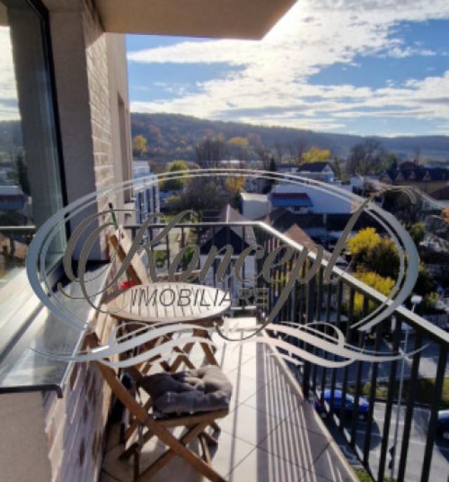 Locuinta luminoasa cu balcon si garaj subteran