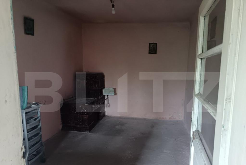 Casa renovabila cu un teren 2000 m intr o zona linistita